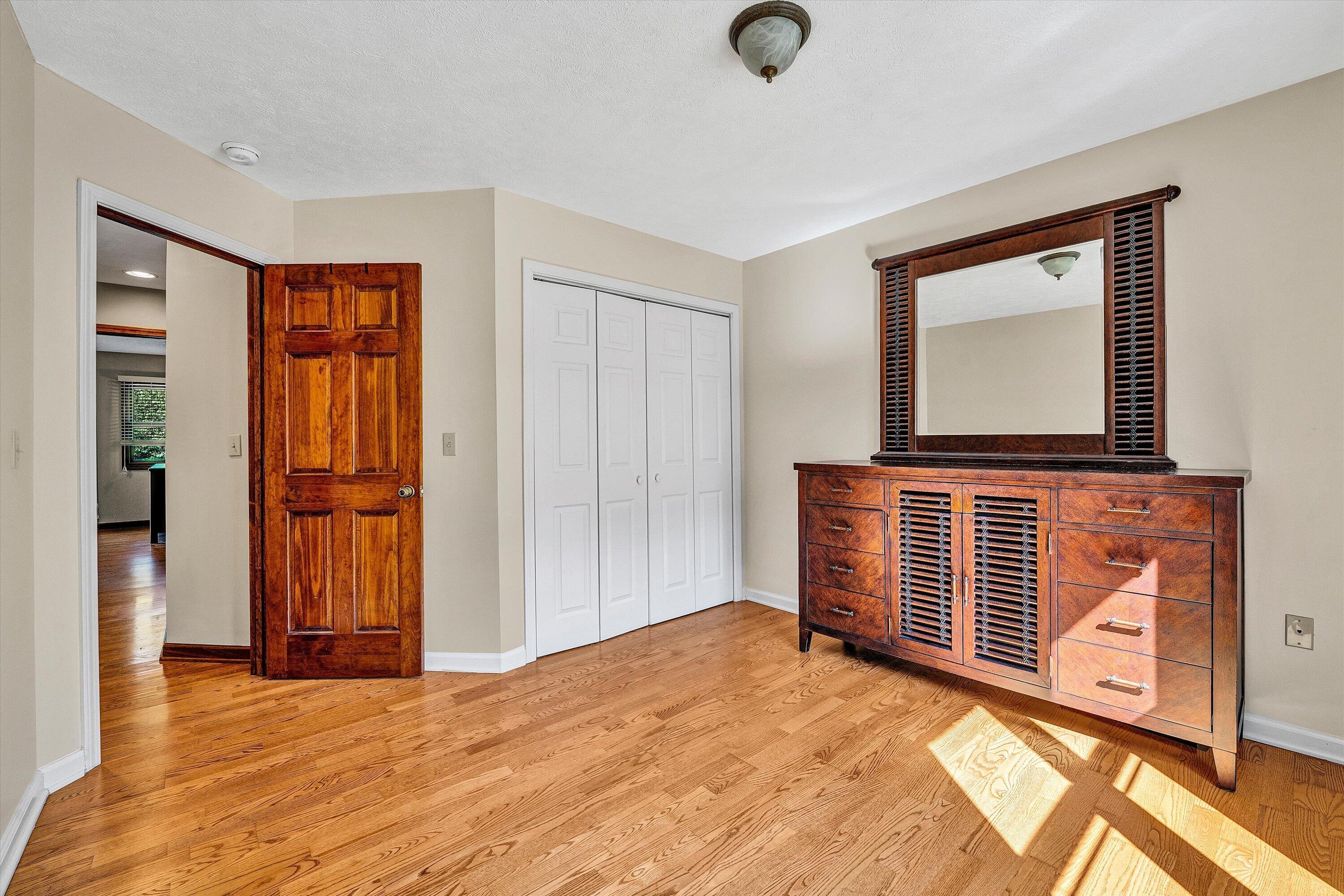 400 Harbor Moneta, VA 24121 - Photo 18 of 51 a view of a room with wooden floor and windows