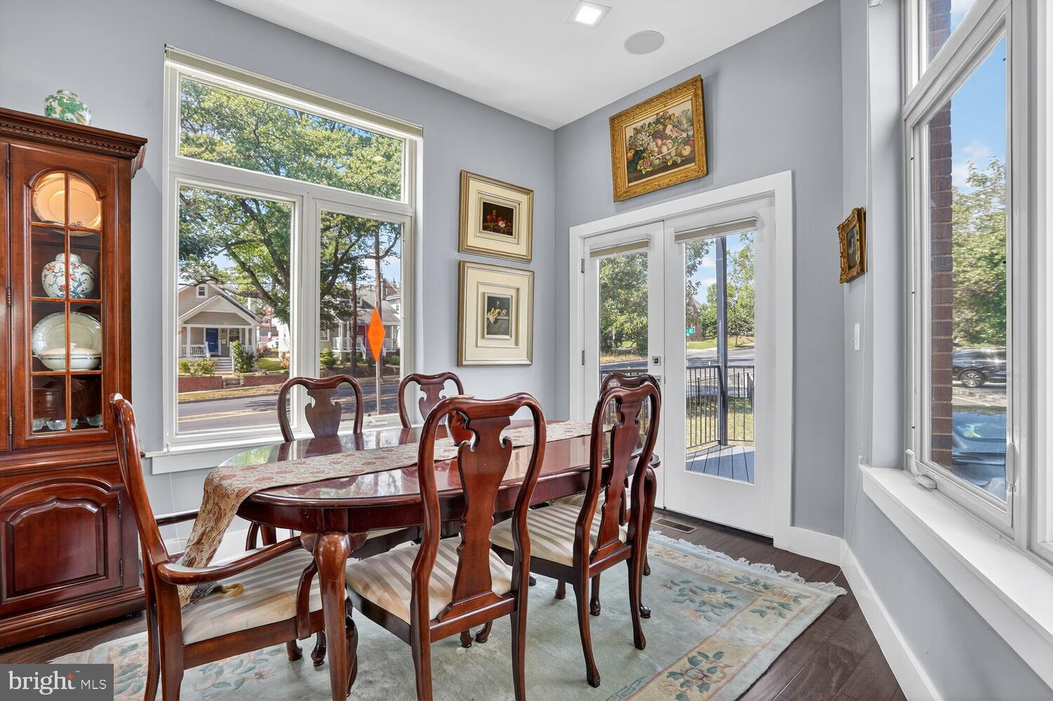 5700 Blair Road Northeast Washington, DC 20011 - Photo 13 of 47 a view of a dining room with furniture large windows and wooden floor