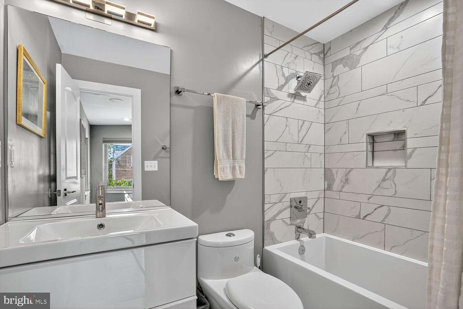 5700 Blair Road Northeast Washington, DC 20011 - Photo 25 of 47 a bathroom with a sink toilet and shower