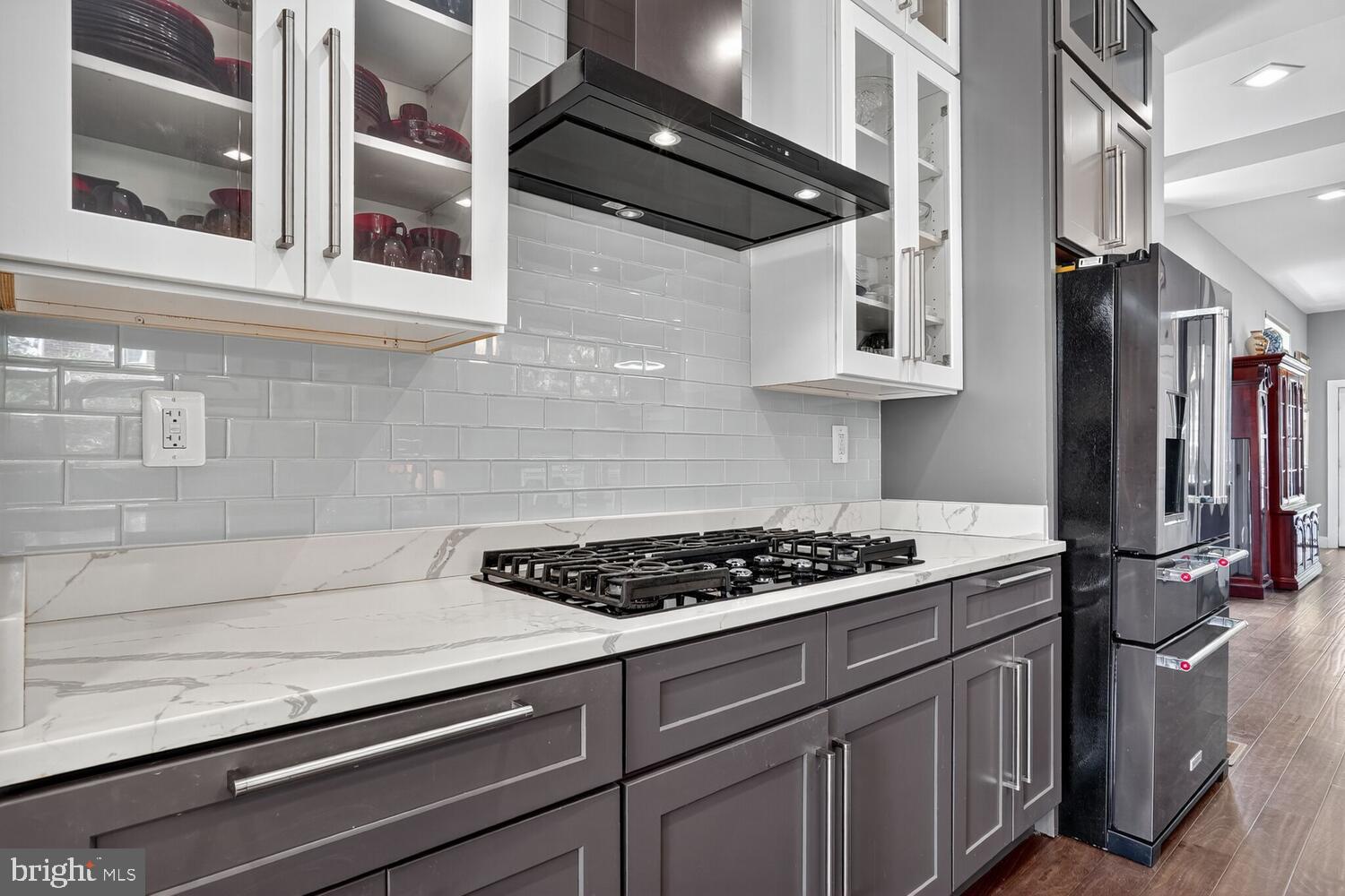 5700 Blair Road Northeast Washington, DC 20011 - Photo 8 of 47 a kitchen with stainless steel appliances granite countertop a stove and a microwave