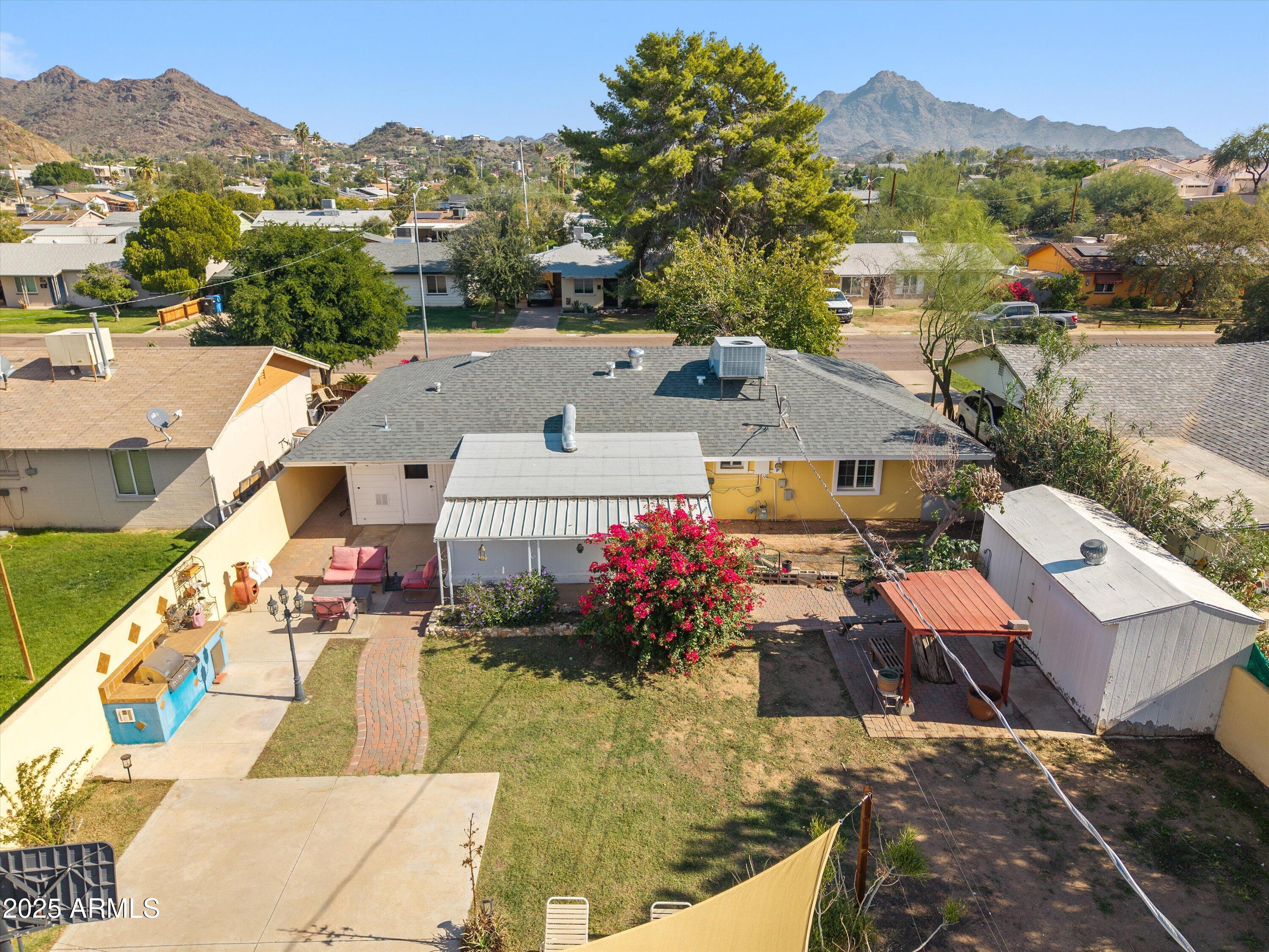 8216 North 9th Street Phoenix, AZ 85020 - Photo 32 of 38 an aerial view of a house with a garden