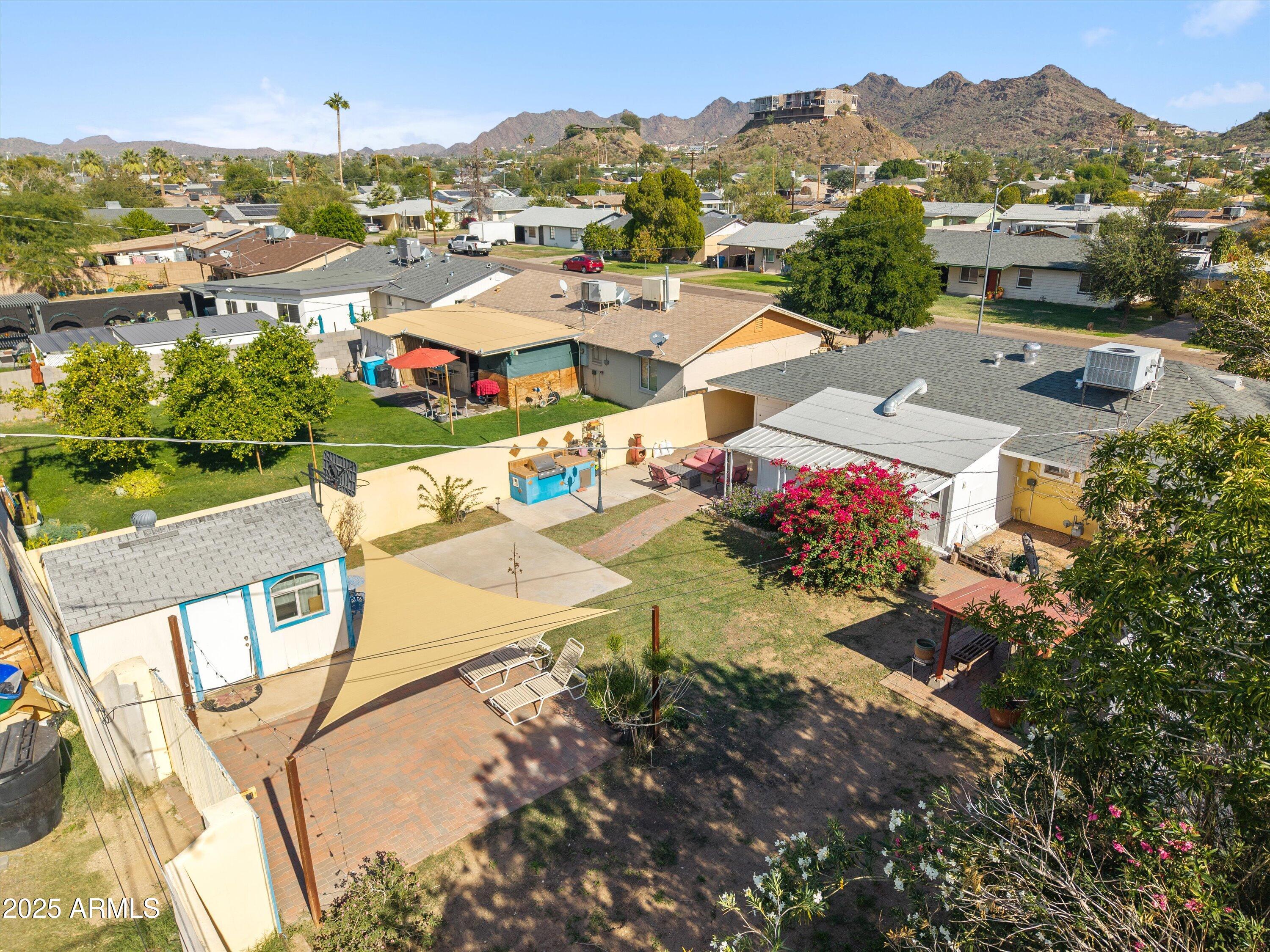 8216 North 9th Street Phoenix, AZ 85020 - Photo 33 of 38 an aerial view of residential houses with outdoor space