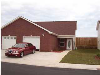 1014 Airport Road, Unit 197 Destin, FL 32541 - Photo 1 of 1 a car parked in front of house