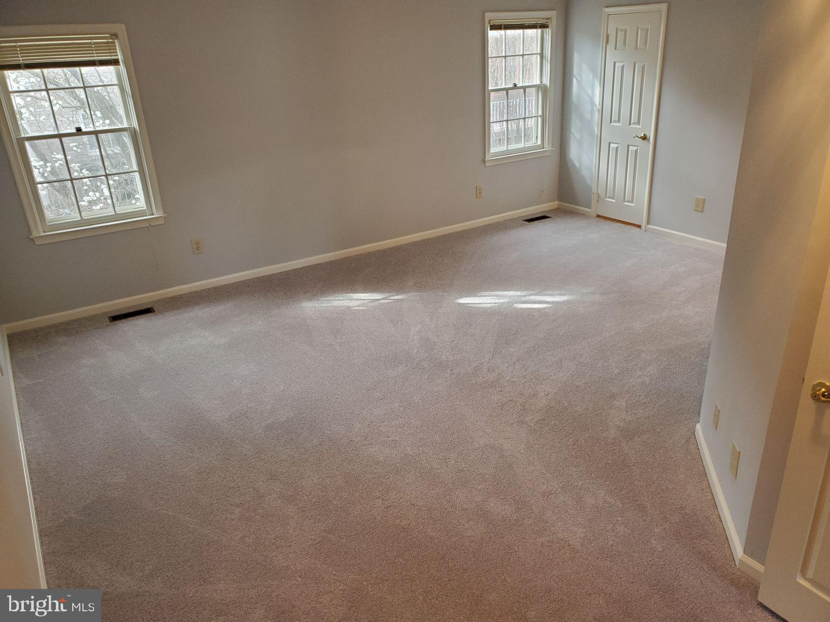 8021 Quarry Ridge Way Bethesda, MD 20817 - Photo 22 of 24 Primary bedroom freshly painted and carpeted