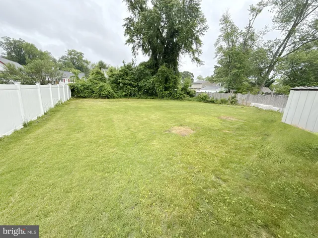 a view of a garden and basketball court