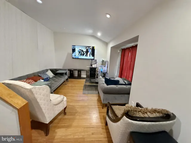 a living room with furniture and a couch