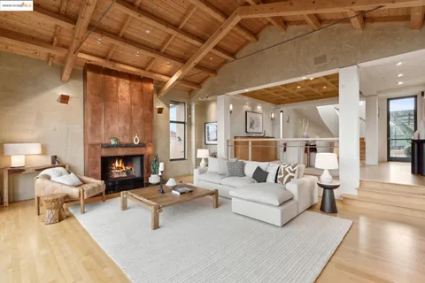 a open kitchen with stainless steel appliances granite countertop a stove and cabinets