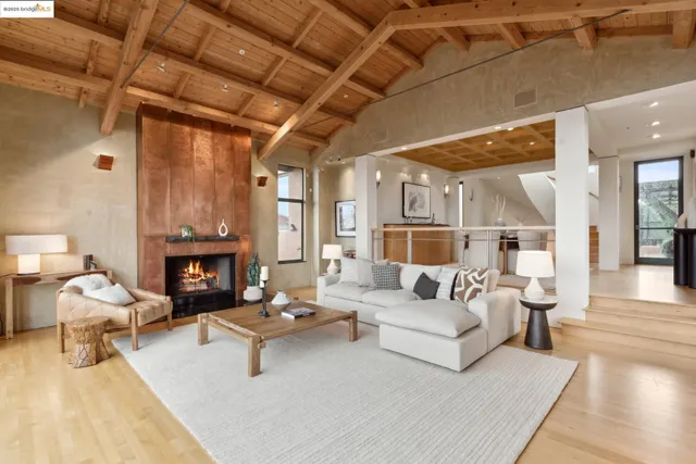 a open kitchen with stainless steel appliances granite countertop a stove and cabinets
