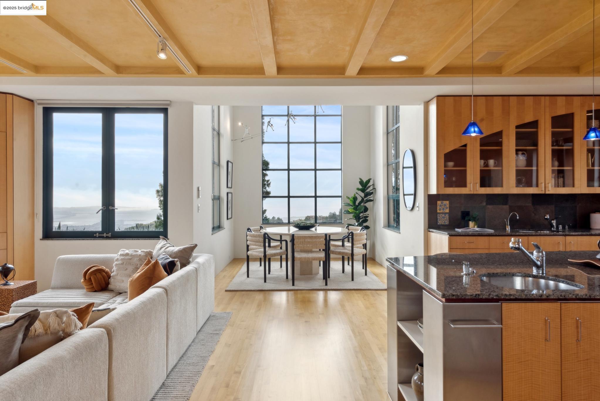 5 Woodside Way Oakland, CA 94611 - Photo 19 of 59 a living room with furniture and large window