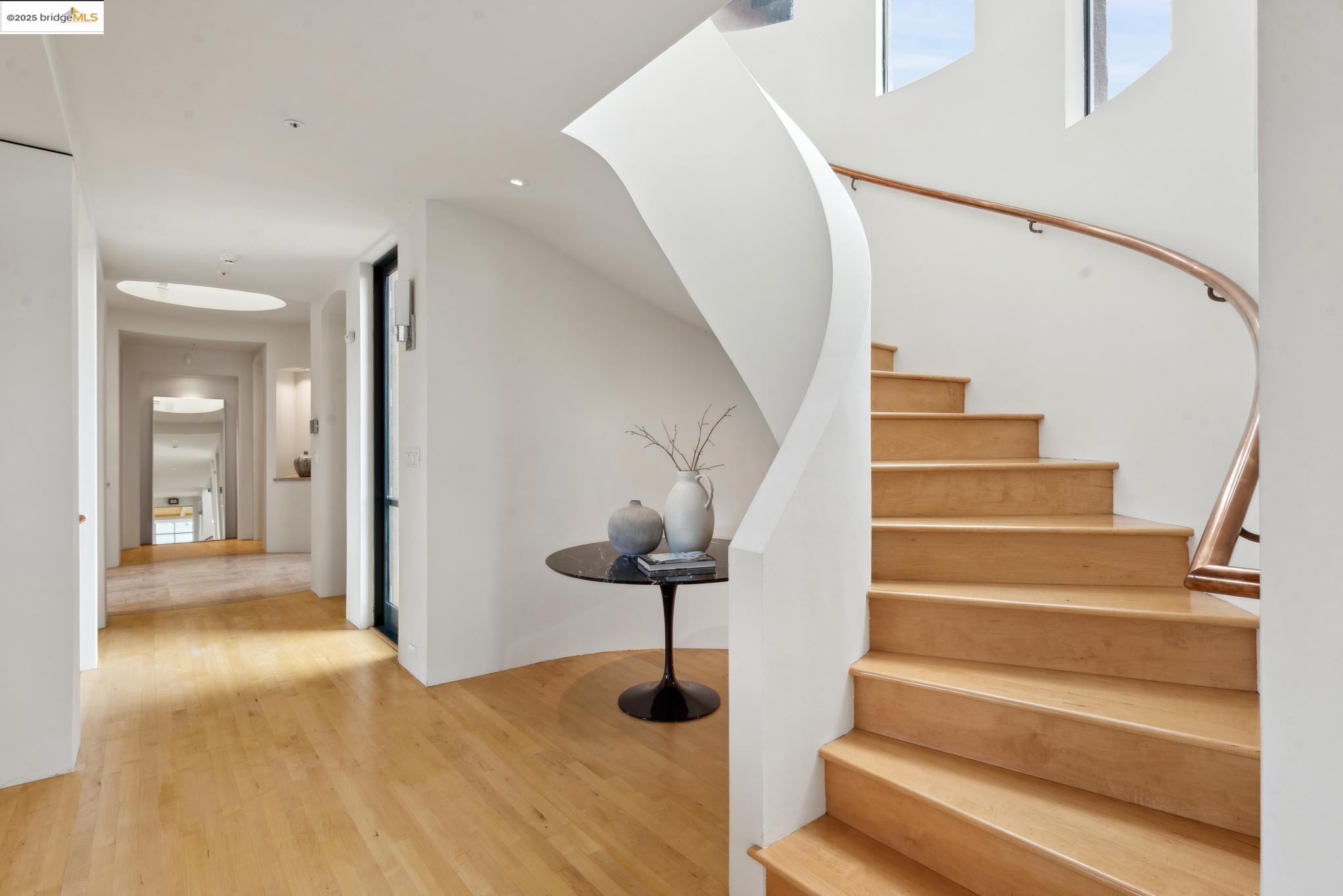 5 Woodside Way Oakland, CA 94611 - Photo 28 of 59 a view of entryway and hall with wooden floor