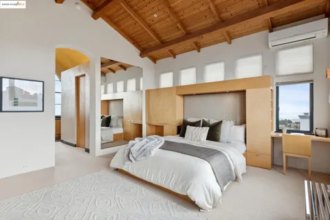 a bathroom with sinks mirror and shower