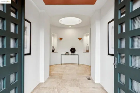 a view of a kitchen with a sink