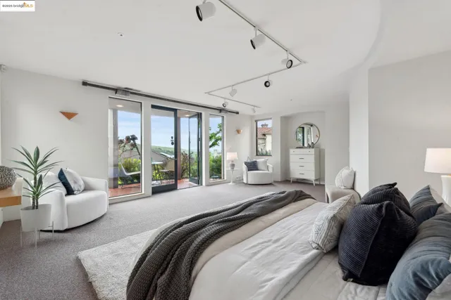a view of a patio with couches table and chairs