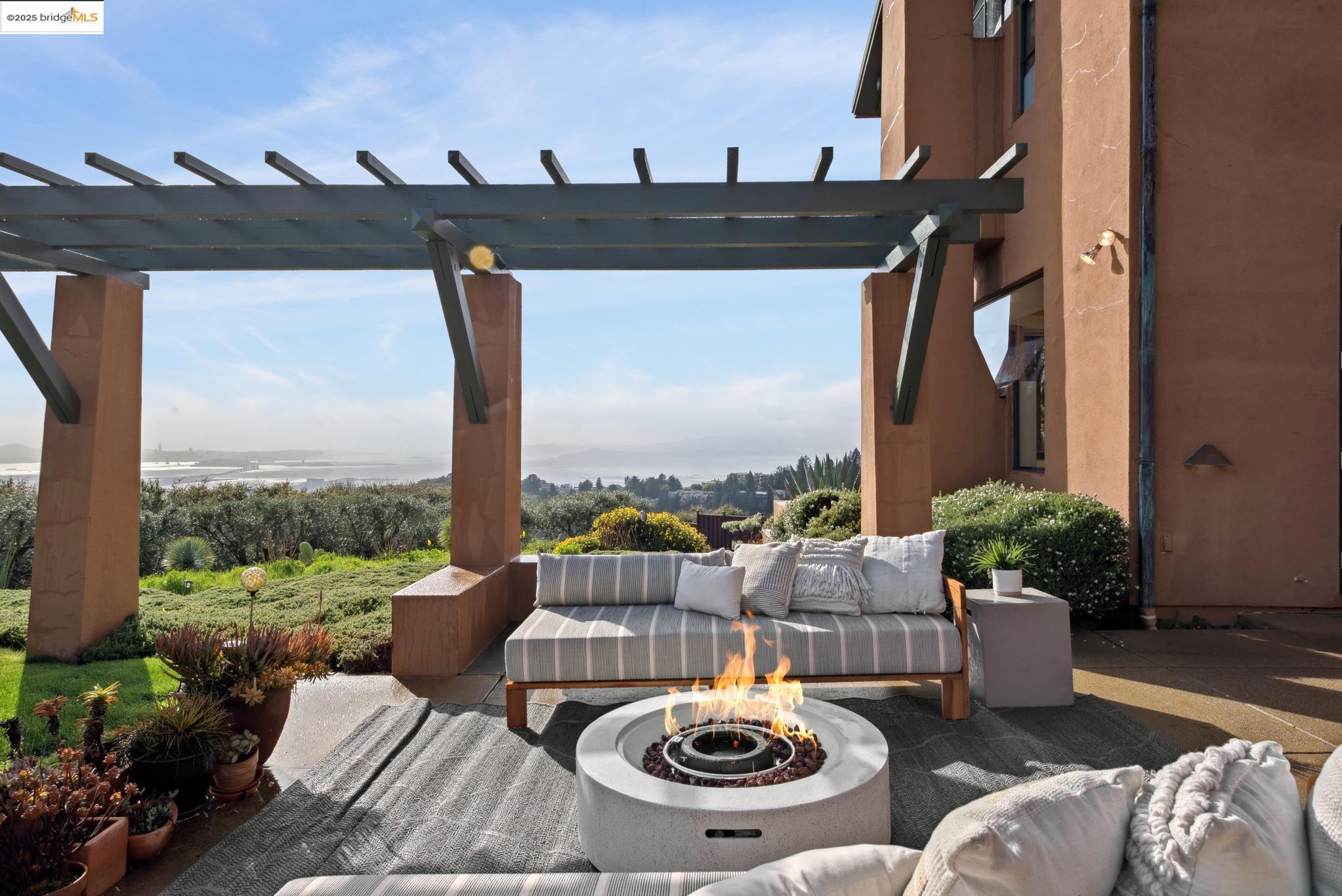 5 Woodside Way Oakland, CA 94611 - Photo 54 of 59 a view of a patio with couches table and chairs