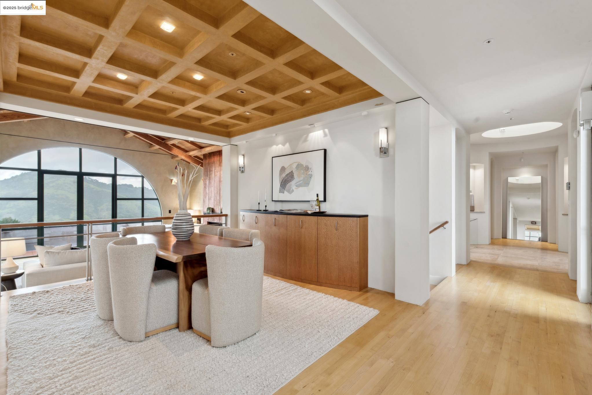 5 Woodside Way Oakland, CA 94611 - Photo 7 of 59 a view of a dining hall with couches and chandelier