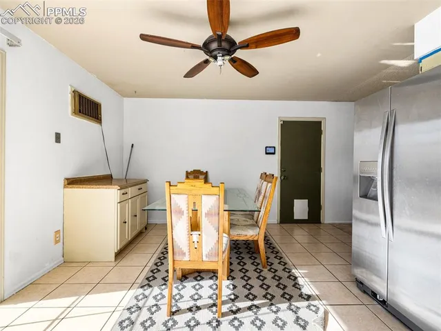 a bathroom with a sink a toilet and a walk in closet