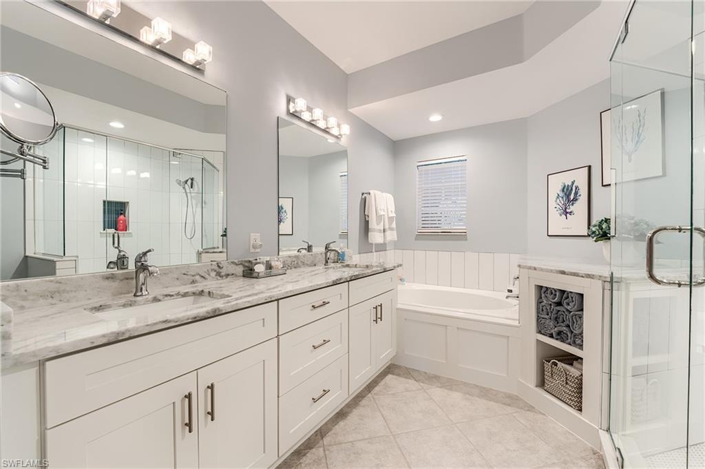 22971 Rosedale Drive, Unit 101 Estero, FL 34135 - Photo 16 of 43 NEW SHAKER CABINETRY, PLUMBING FIXTURES, LIGHT FIXTURES AND QUARTZ COUNTERTOPS