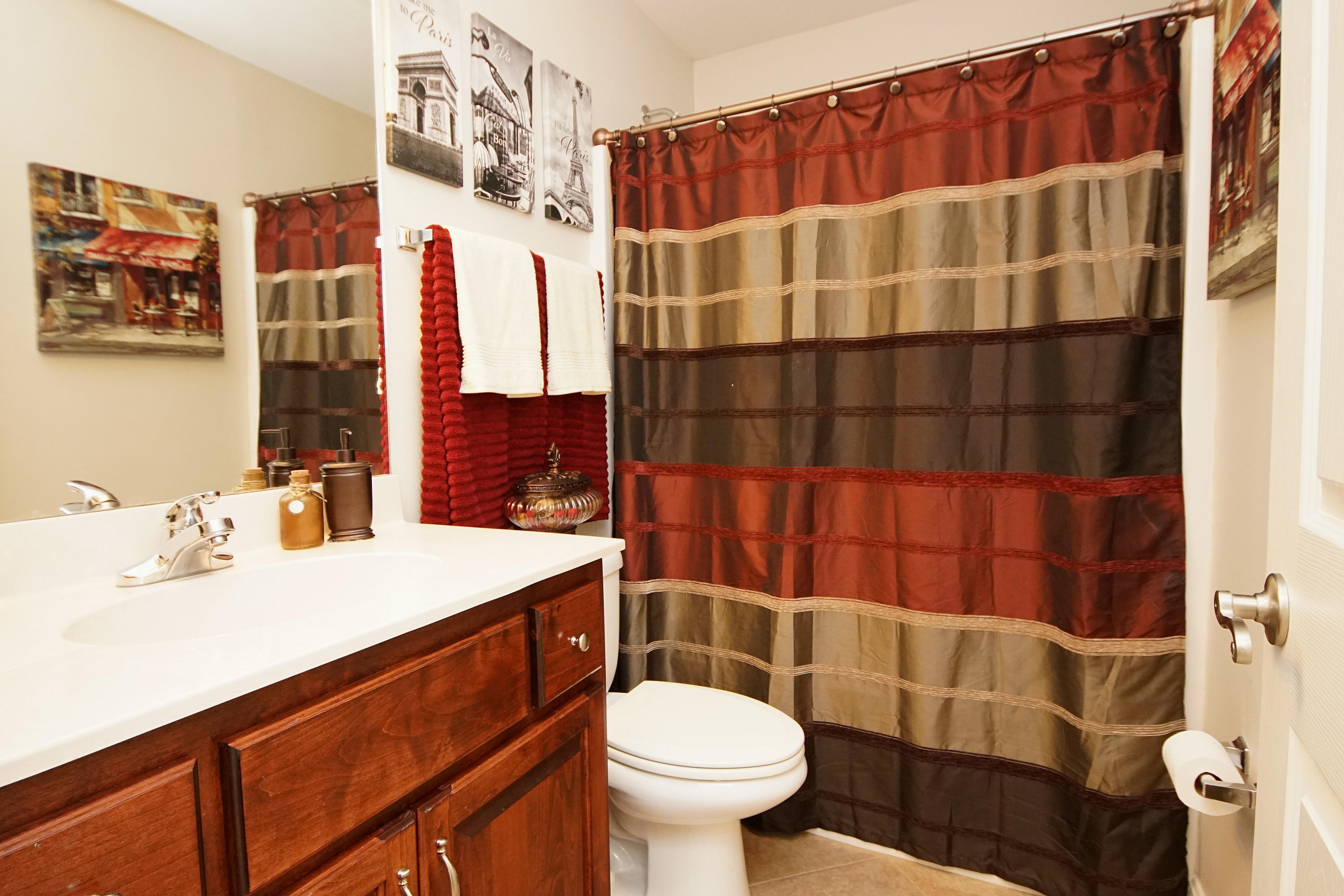 4613 Chanan Drive Crestview, FL 32539 - Photo 23 of 44 a bathroom with a sink toilet and shower