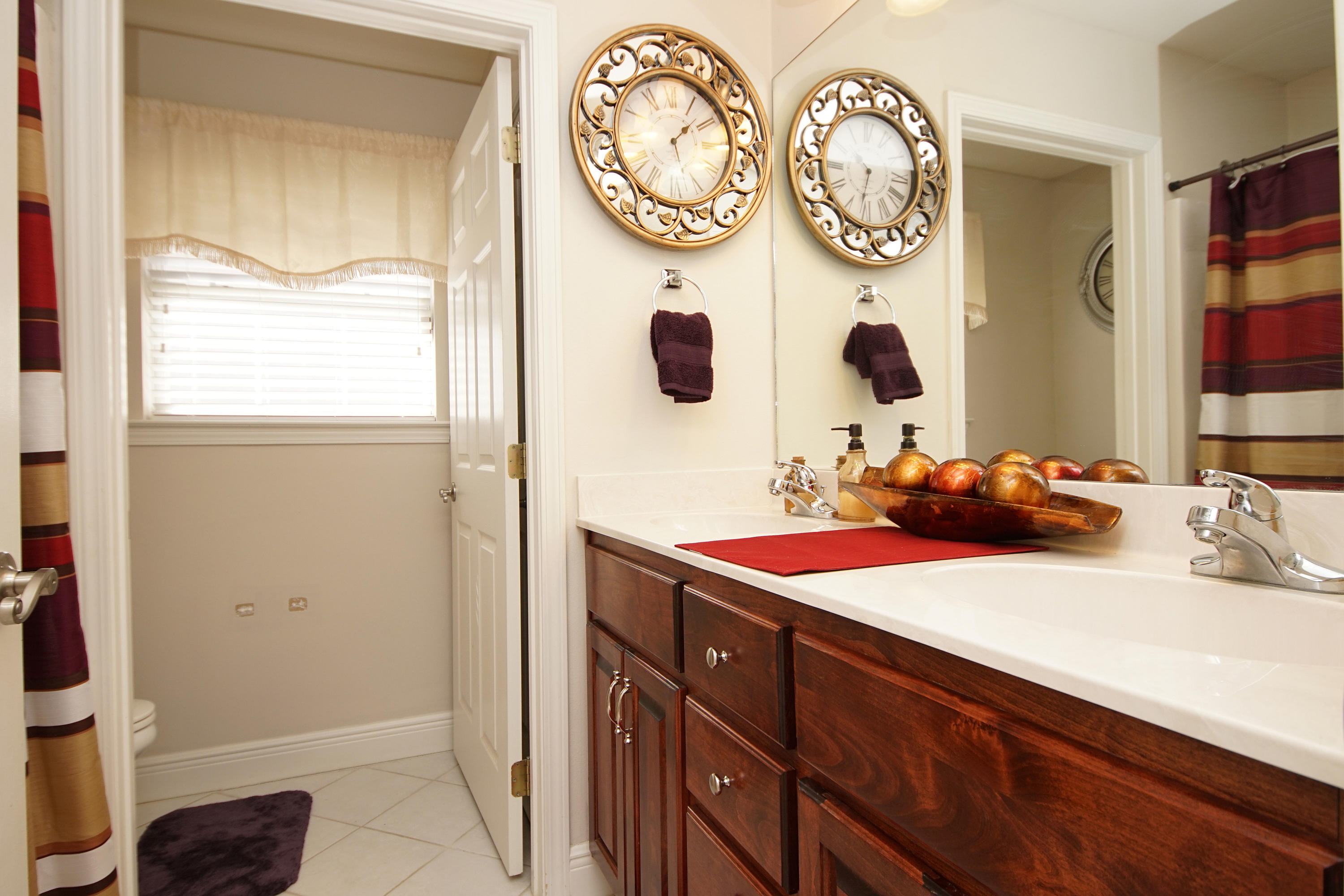 4613 Chanan Drive Crestview, FL 32539 - Photo 24 of 44 a bathroom with a sink and a mirror