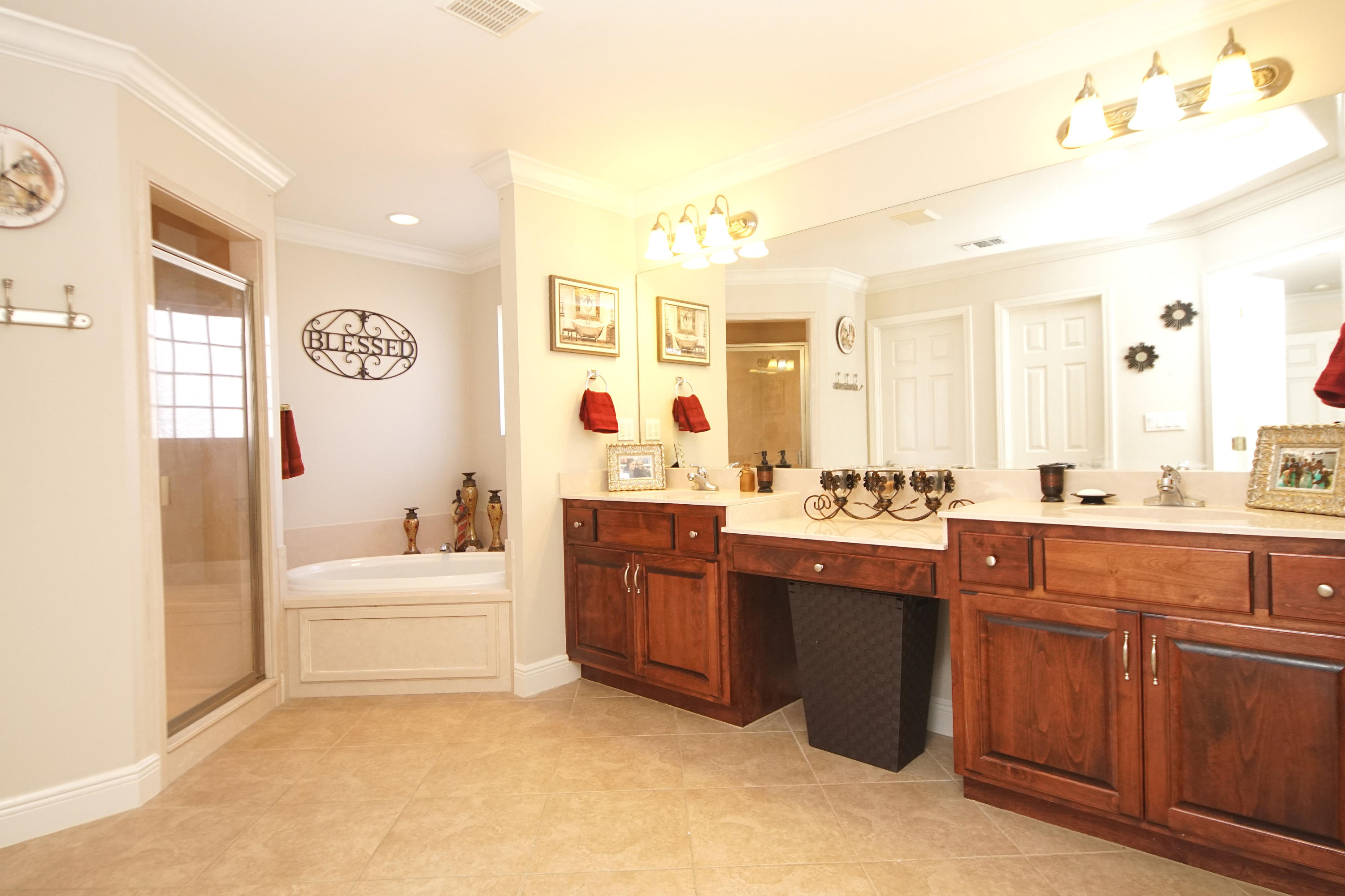 4613 Chanan Drive Crestview, FL 32539 - Photo 28 of 44 a spacious bathroom with a tub sink and mirror