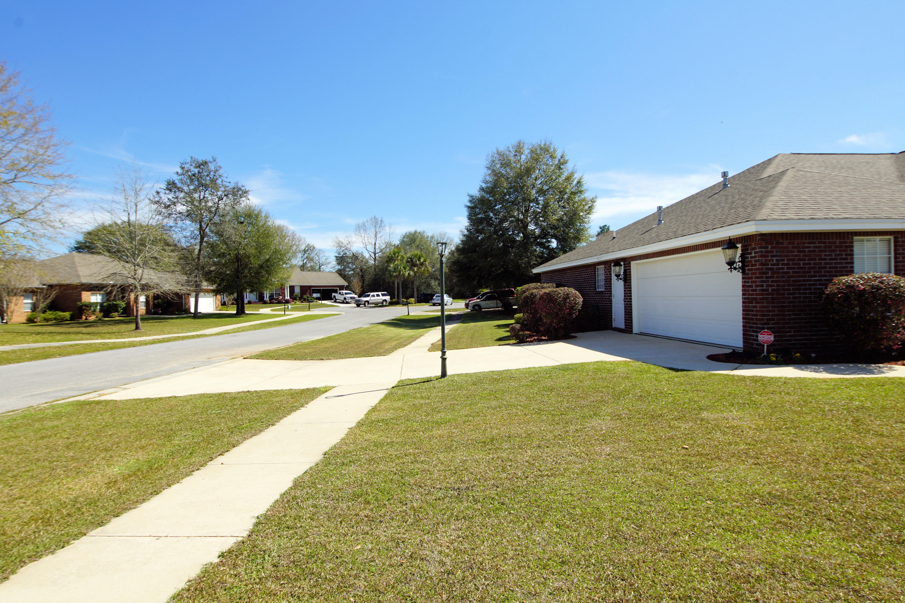 4613 Chanan Drive Crestview, FL 32539 - Photo 40 of 44 a view of a house with basketball court