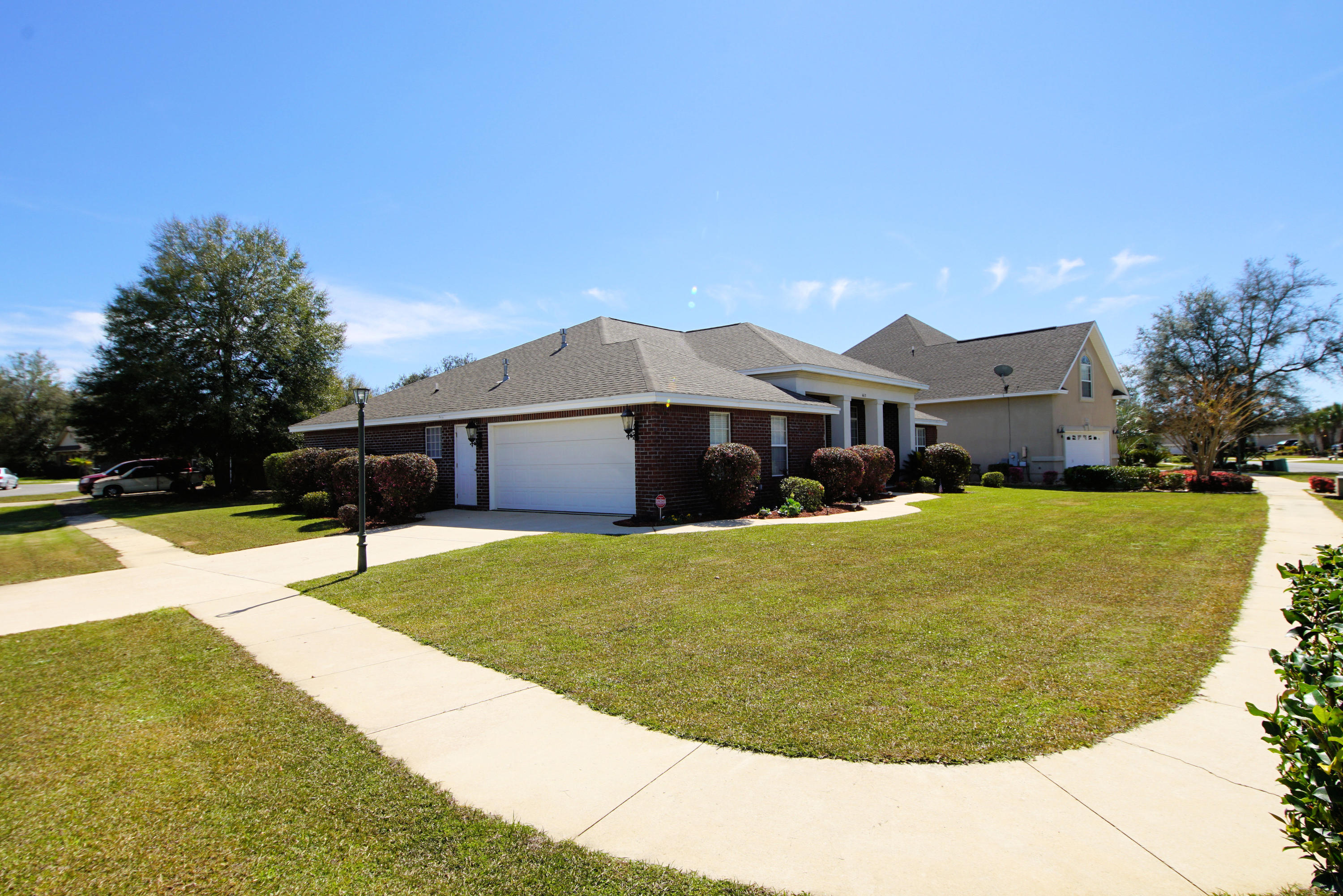 4613 Chanan Drive Crestview, FL 32539 - Photo 41 of 44 a view of outdoor space yard and swimming pool