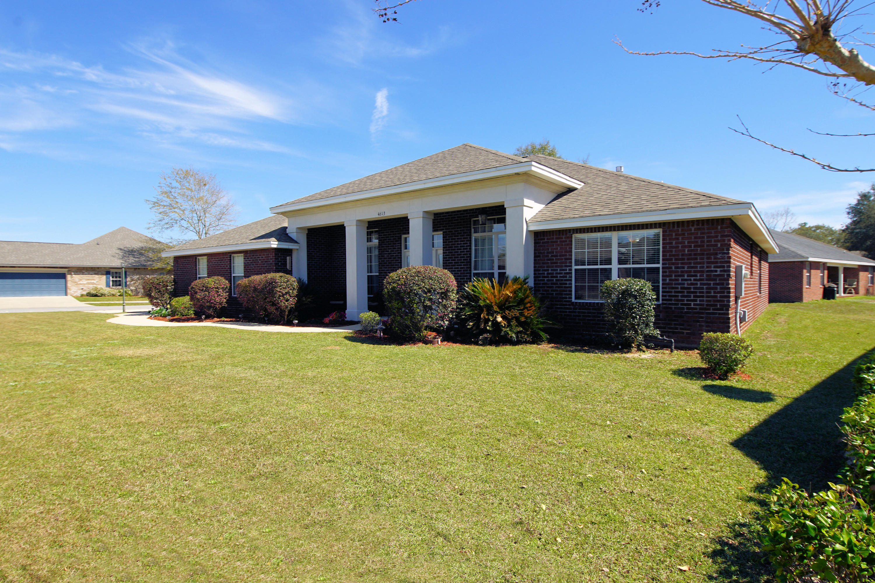 4613 Chanan Drive Crestview, FL 32539 - Photo 43 of 44 a front view of a house with garden
