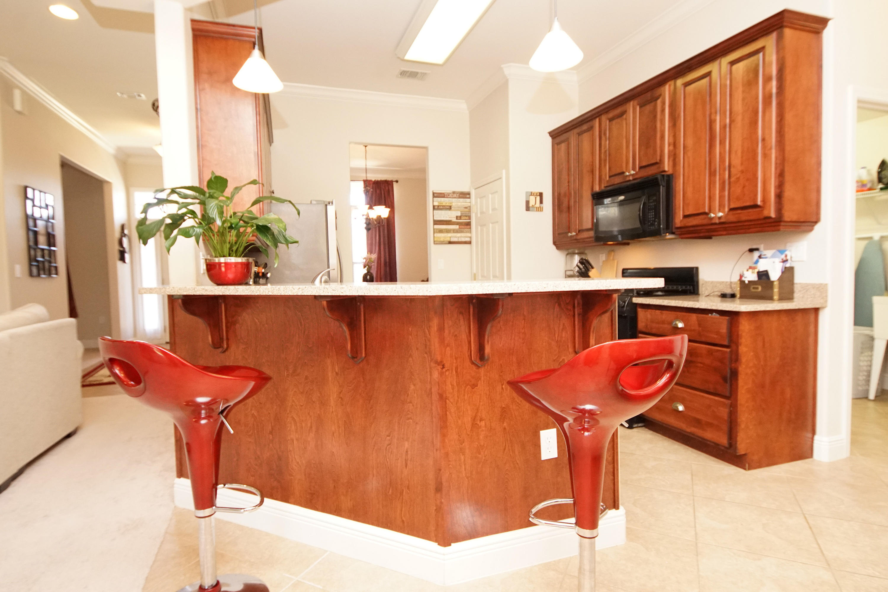 4613 Chanan Drive Crestview, FL 32539 - Photo 7 of 44 a kitchen with a sink and cabinets