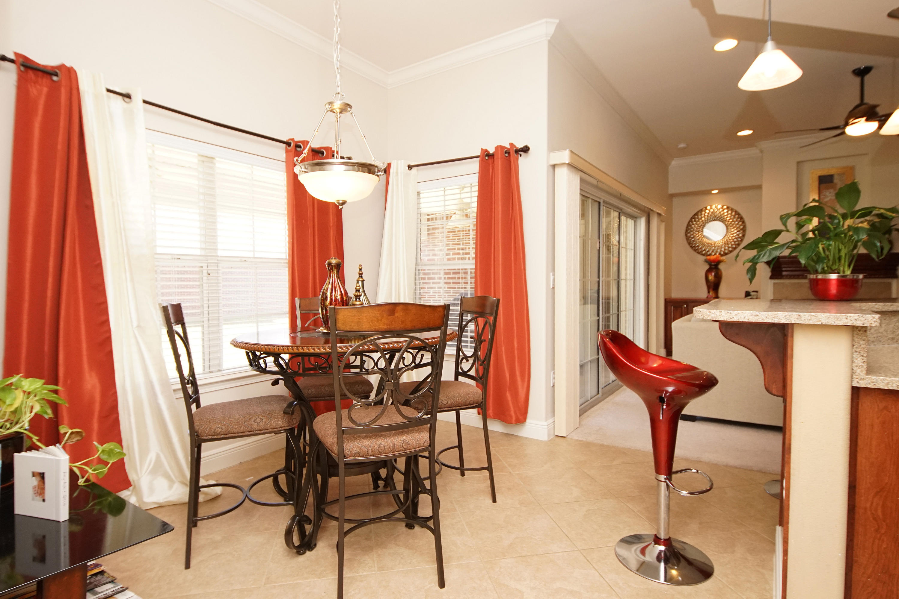 4613 Chanan Drive Crestview, FL 32539 - Photo 8 of 44 a dining room with furniture and a window
