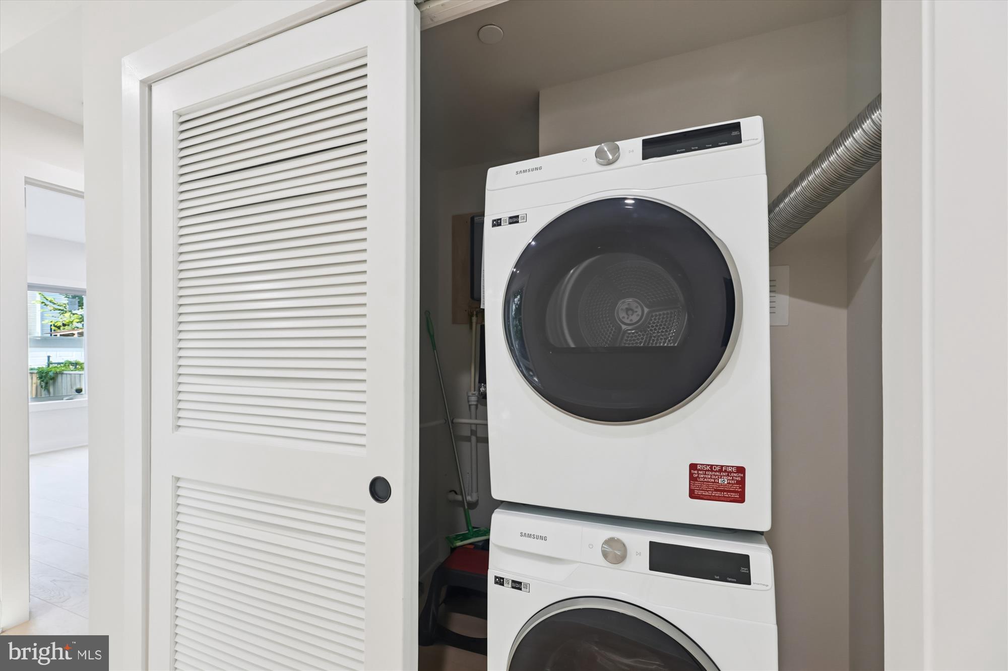 1910 Benning Road Northeast, Unit 2 Washington, DC 20002 - Photo 18 of 19 a utility room with dryer and washer