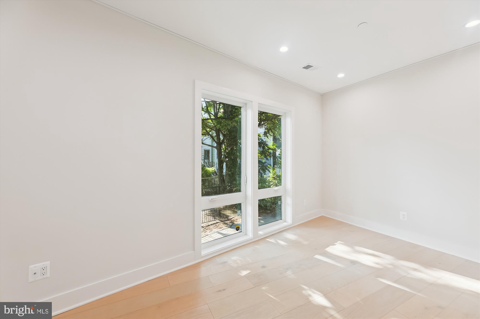 1910 Benning Road Northeast, Unit 2 Washington, DC 20002 - Photo 6 of 19 a view of an empty room with a window