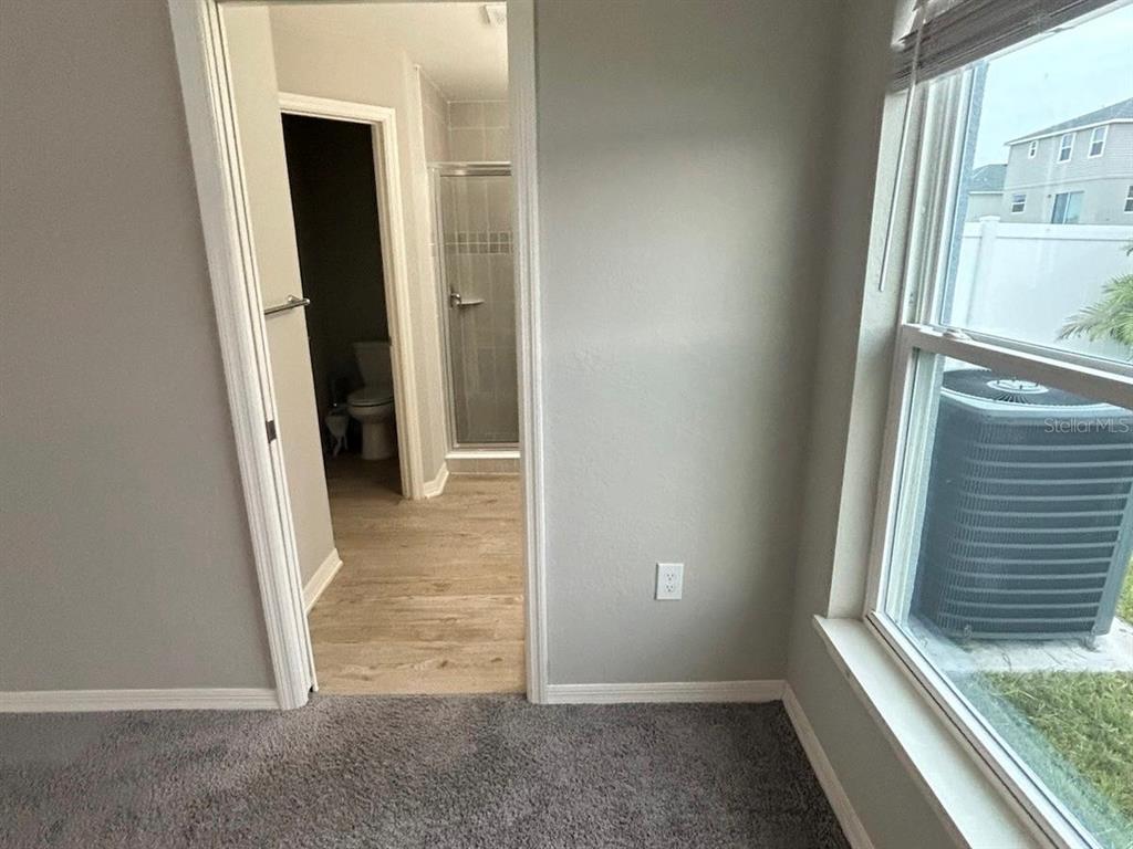 4098 Ruby Run Haines City, FL 33844 - Photo 20 of 34 an empty room with windows