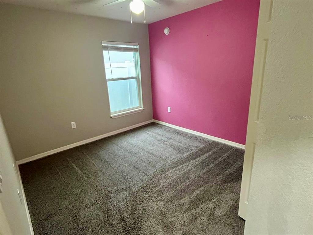 4098 Ruby Run Haines City, FL 33844 - Photo 24 of 34 an empty room with windows