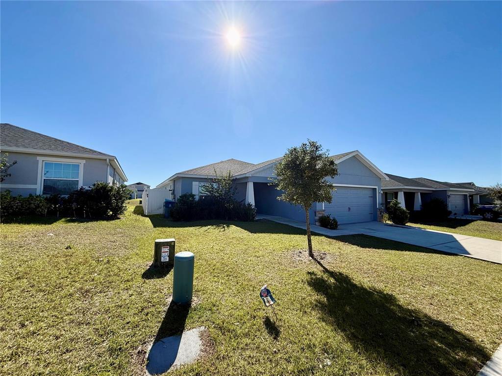4098 Ruby Run Haines City, FL 33844 - Photo 4 of 34 a swimming pool view with a outdoor space