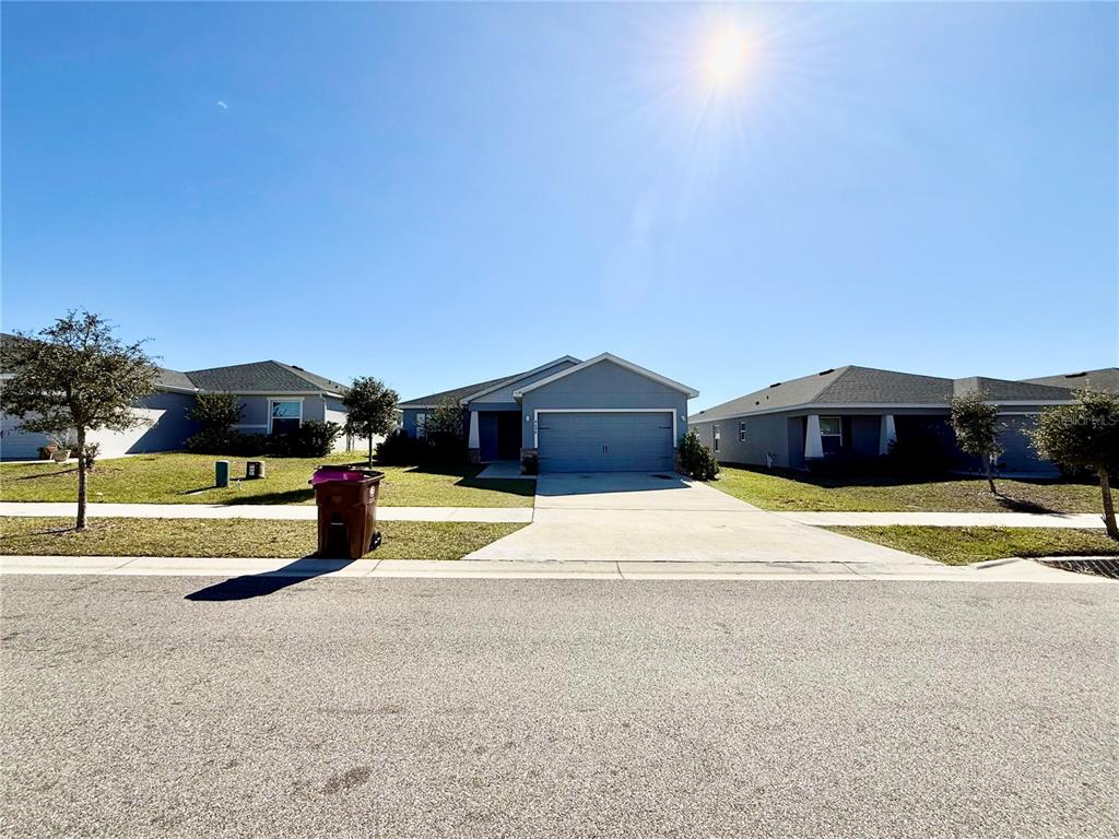 4098 Ruby Run Haines City, FL 33844 - Photo 6 of 34 a house view with a outdoor space