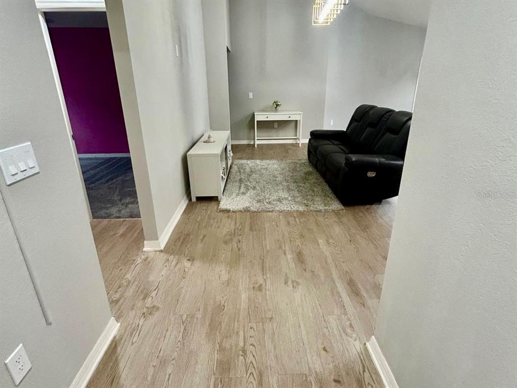 4098 Ruby Run Haines City, FL 33844 - Photo 9 of 34 a living room with furniture and a rug