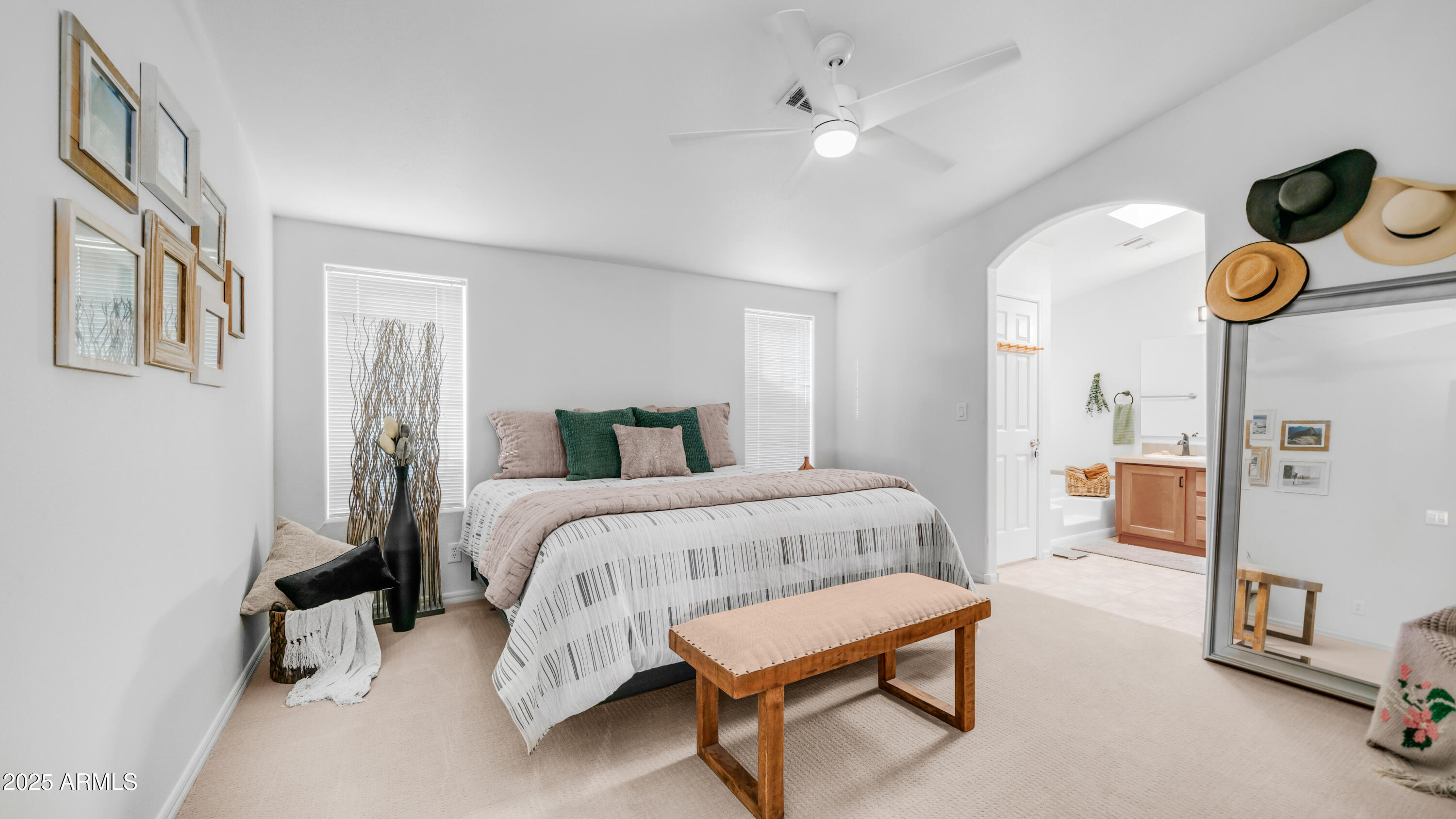 2550 South Ellsworth Road, Unit 751 Mesa, AZ 85209 - Photo 15 of 27 a spacious bedroom with a bed and closet