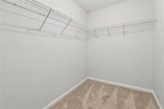 a view of a room with racks on the wall