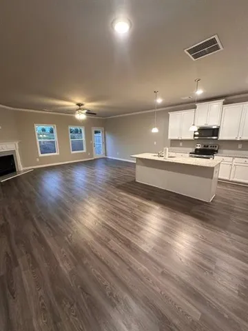 a view of kitchen and sink