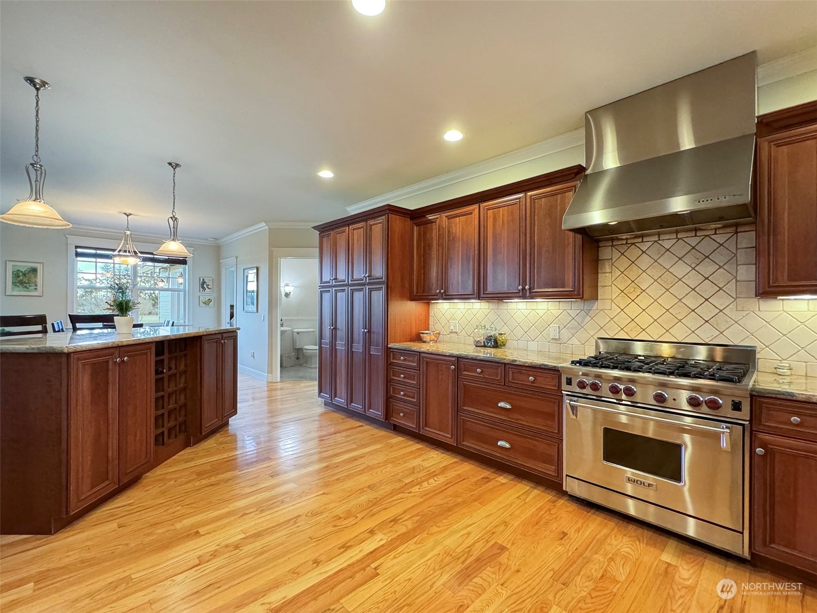 31 Fergy Lane Sequim, WA 98382 - Photo 13 of 40 a kitchen with stainless steel appliances granite countertop a stove a sink and a refrigerator