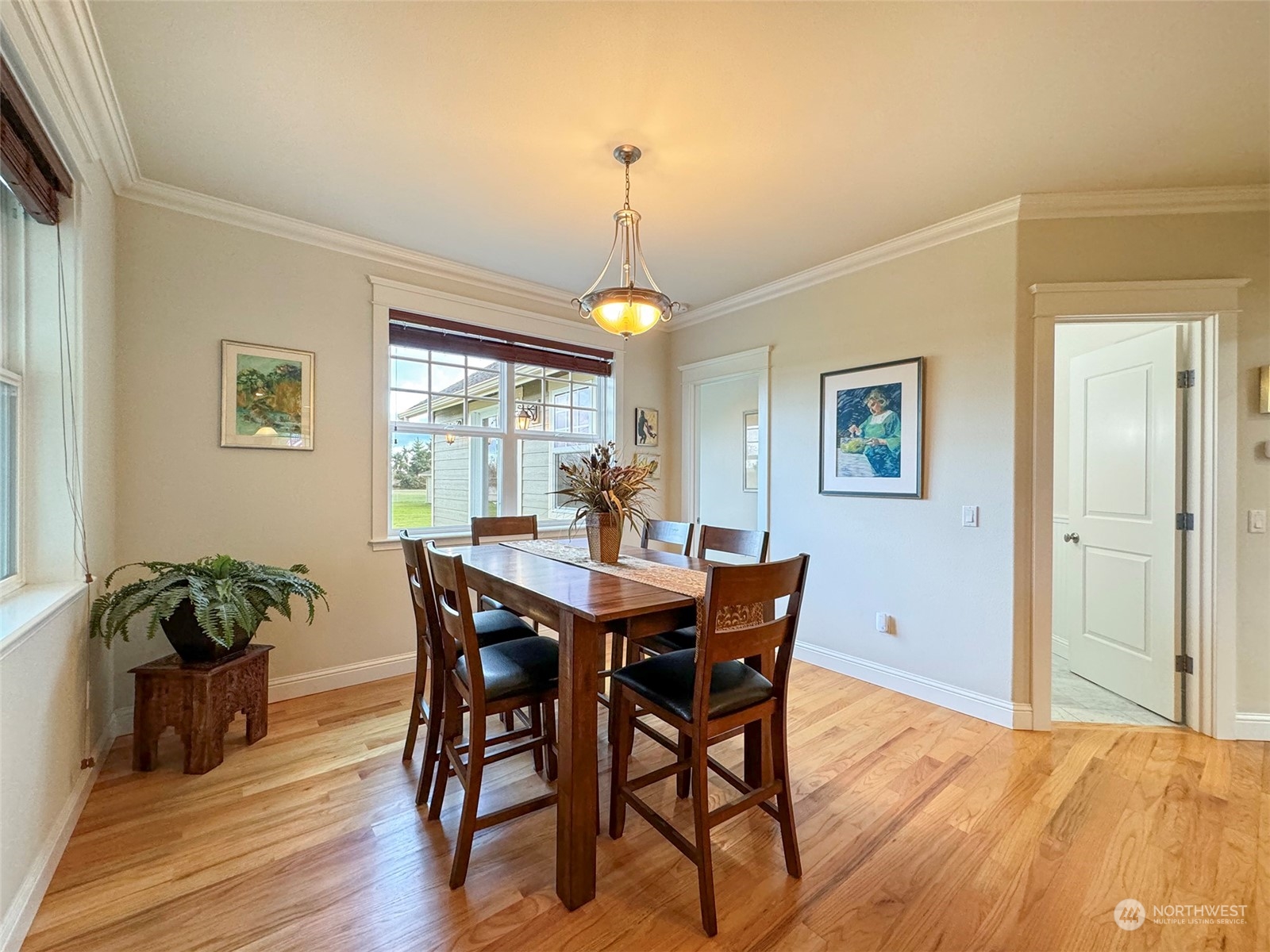 31 Fergy Lane Sequim, WA 98382 - Photo 14 of 40 a view of a dining room with furniture window and wooden floor