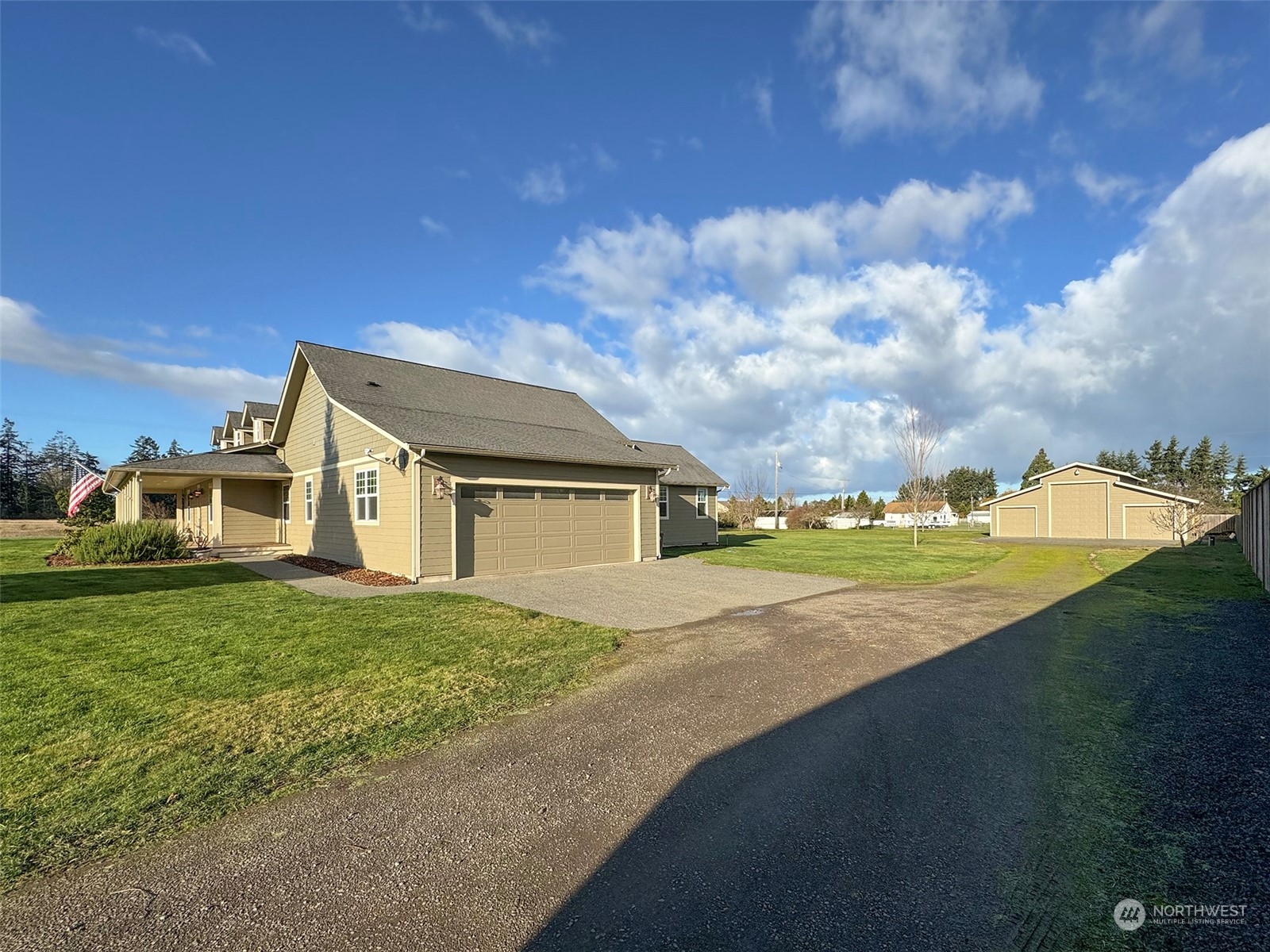 31 Fergy Lane Sequim, WA 98382 - Photo 32 of 40 a view of a house with a big yard and a large tree