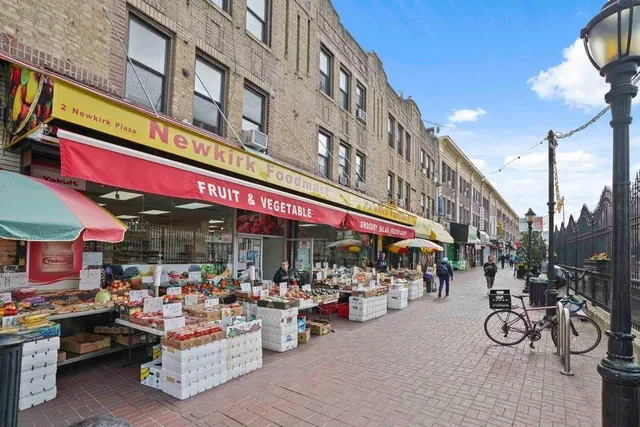 a view of street with sitting area