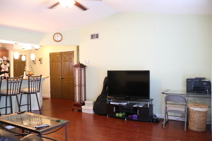 6288 Launch Club Circle Jupiter, FL 33458 - Photo 7 of 12 living room 2
