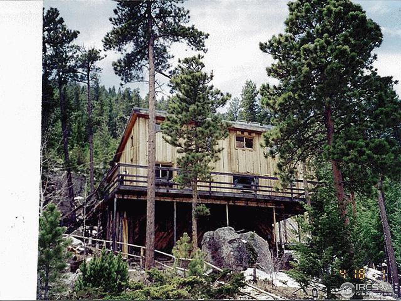 2306 Stratton Park Road Bellvue, CO 80512 - Photo 1 of 1 front view of a house with a small yard