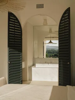 a view of a living room and bathroom