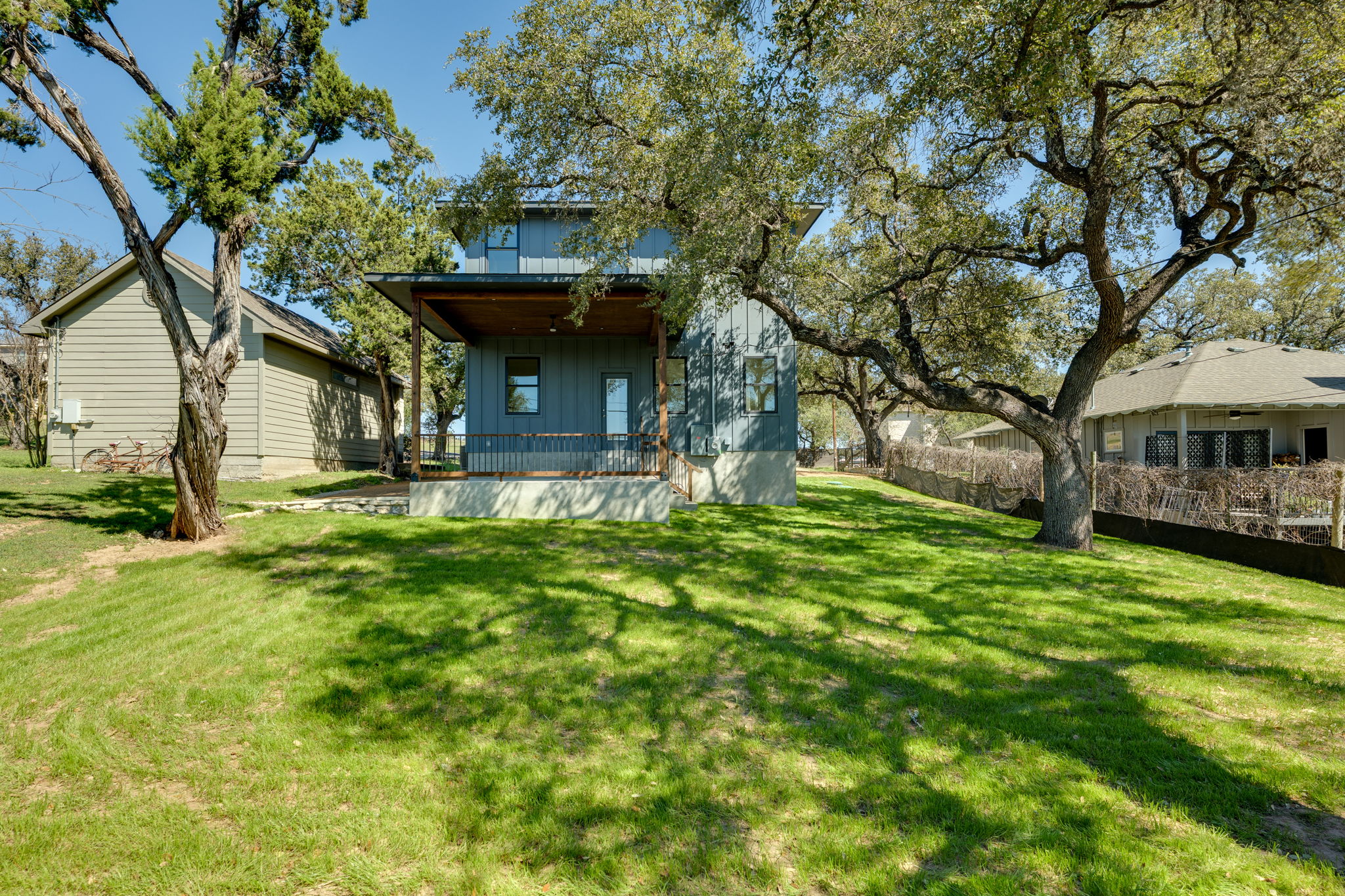 3014 Brass Buttons Trail Austin, TX 78734 - Photo 34 of 35 Flat backyard and three heritage oak trees.