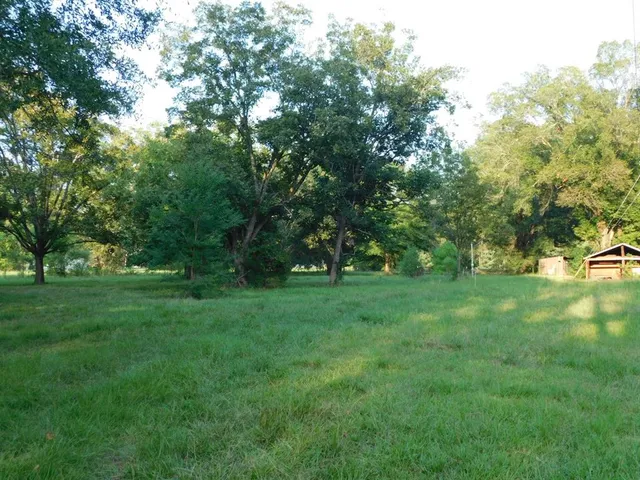 a view of a wooden fence