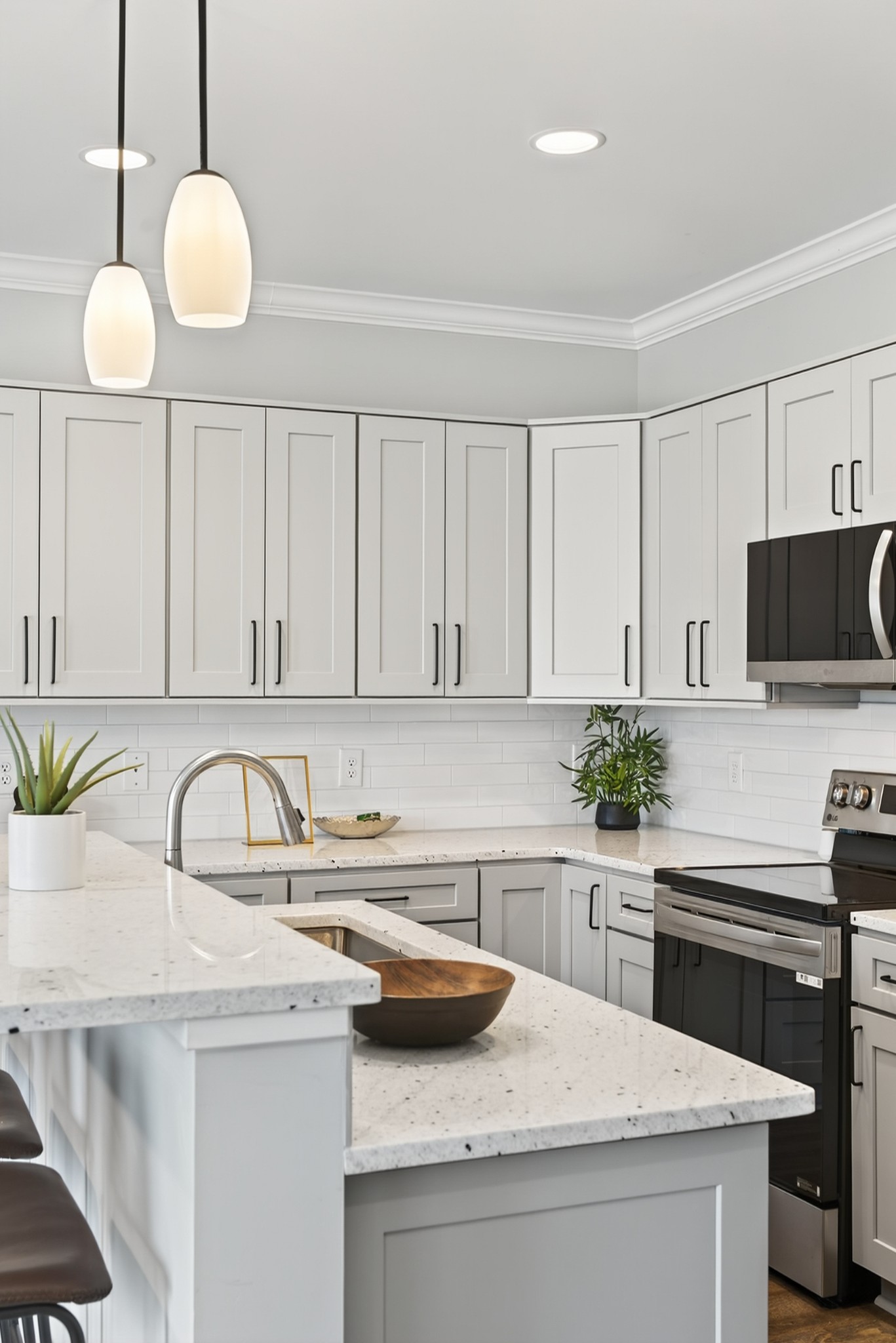 100 Maple View Drive Lebanon, TN 37087 - Photo 5 of 35 a kitchen with granite countertop a sink a stove and cabinets