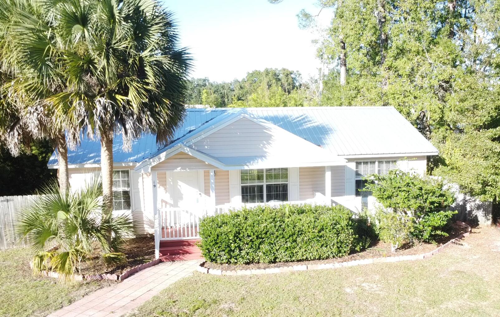 front view of house with a yard
